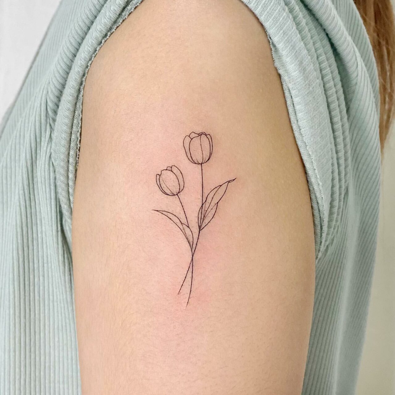 25 Eye Catching Tulip Tattoo Ideas Pictures Sheideas 25 Eye Catching Tulip Tattoo Ideas Pictures Sheideas