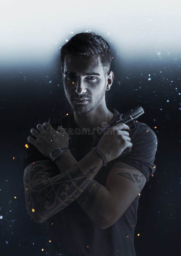 A Man With A Black And White Tattoo On His Arm Holding A Bird In The Air A Man With A Black And White Tattoo On His Arm Holding A Bird In The Air