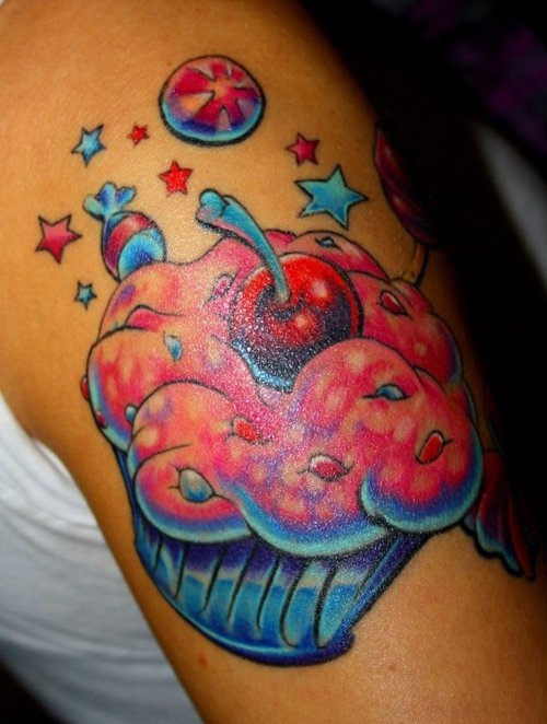 A Woman S Arm With A Cupcake Tattoo On It A Woman S Arm With A Cupcake Tattoo On It