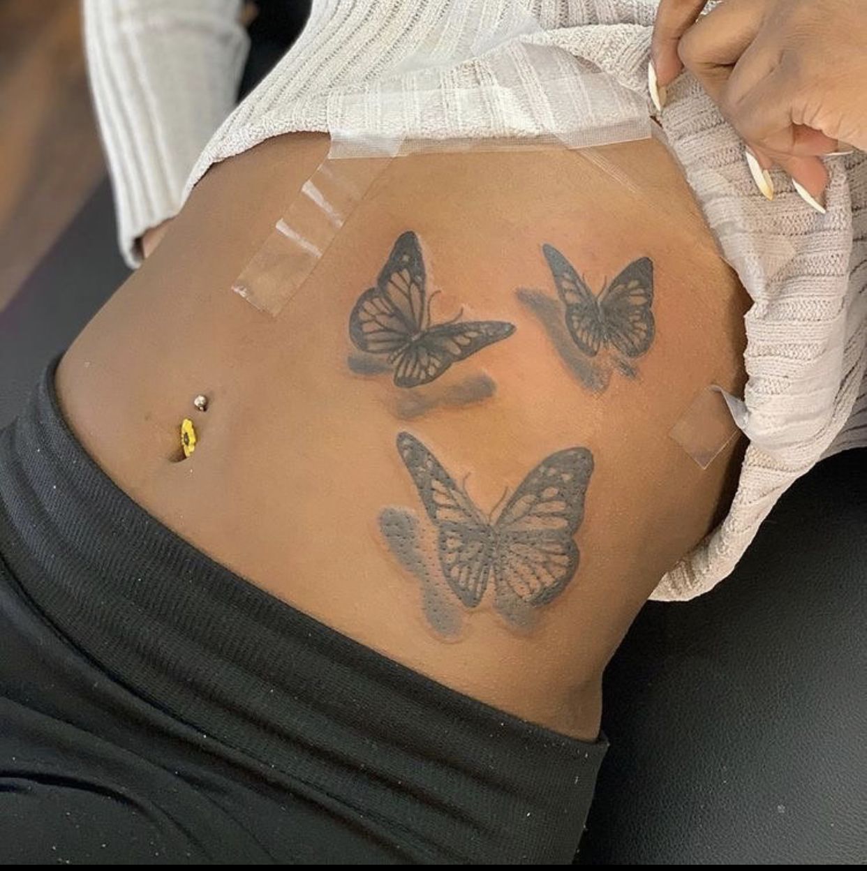 Butterfly Image Tattoos On Lower Stomach Of Girl Butterfly Image Tattoos On Lower Stomach Of Girl
