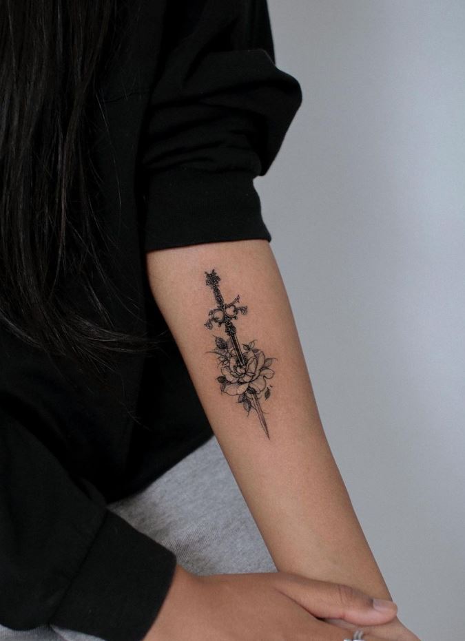 Little Sword Tattoo Located On The Inner Arm Little Sword Tattoo Located On The Inner Arm